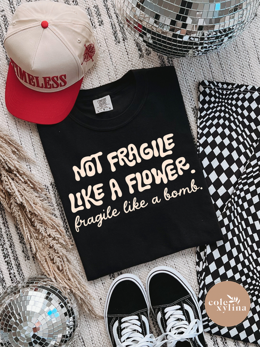 NOT FRAGILE LIKE A FLOWER - DTF TRANSFER