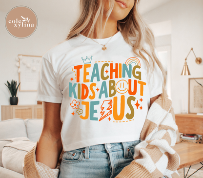 TEACHING KIDS ABOUT JESUS A1 (2 COLOR OPTIONS) - DTF TRANSFER